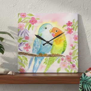 Wasserfarb-Liebesvögel mit rosa Blumen Quadratische Wanduhr