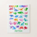 Wasserfarbe Dinosaurier Alphabet Farbenfroh Dino K Puzzle<br><div class="desc">Wasserfarbe Dinosaurier Alphabet farbenfrohe Dino Kindermuster. Dinosaurier für jeden Buchstaben des Alphabets in einer farbenfrohen Aquarell-Silhouette. Personalisieren mit Namen.</div>