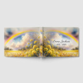 Wasserfarbenbogenbogen über der Wiese der Wildblum Gästebuch (Voll)