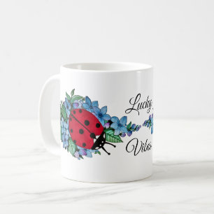 Wasserfarbener Niedlicher Ladybird mit blauen Blum Kaffeetasse
