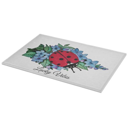 Wasserfarbener Niedlicher Ladybird mit blauen Blum Schneidebrett (Ecke)