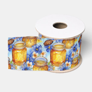 Wasserfarbenfrohe Töpfe aus Honig mit blauen Blume Ripsband
