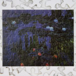 Wasserlilien von Claude Monet, Vintager Impression Puzzle<br><div class="desc">Wasserlilien (1915) von Claude Monet ist ein Vintager Impressionismus der Kunst Naturmalerei. Die dunkleren Töne implizieren, dass er dieses Meisterwerk nachts gemalt hat. Eines von vielen Gemälden der Wasserlilie, die Monet in seinem Blumengarten im Frühjahr in Giverny, Frankreich, vom Teich gemalt hat. Über den Künstler: Claude Monet (1840-1926) war Gründer...</div>