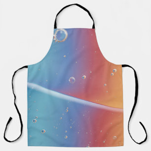 WASSERTROPFEN AUF BLAUEN KUNSTSTOFF SCHÜRZE