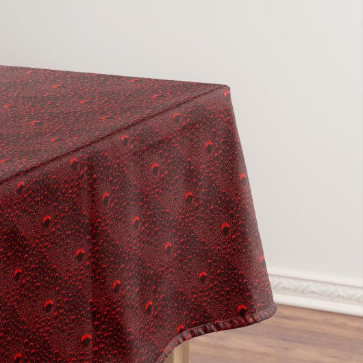 Wassertropfen auf Krimsonmetall Tischdecke (Beispiel)