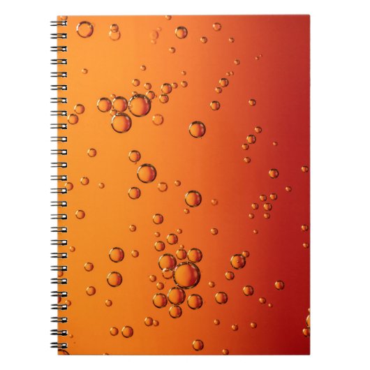 Wassertropfen auf orangefarbener Oberfläche Notizblock (Vorderseite)