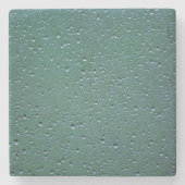 Wassertropfen im grünen Hintergrund Steinuntersetzer (Vorderseite)