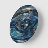 Wasseruhr durch die Dichterin Adiela Akoo Runde Wanduhr (Winkel)