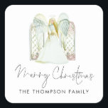 Watercolor Angel Merry Christmas Script Quadratischer Aufkleber<br><div class="desc">Watercolor Engel Frohe Weihnachtsschrift. Eine wunderschöne Engel- und Fensterszene,  und Fröhliche Weihnachten in einem eleganten Set Handschrift Stil Skript Einfach personalisieren Sie Ihren Namen.</div>