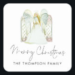 Watercolor Angel Merry Christmas Script Quadratischer Aufkleber<br><div class="desc">Watercolor Engel Frohe Weihnachtsschrift. Eine wunderschöne Engel- und Fensterszene,  und Fröhliche Weihnachten in einem eleganten Set Handschrift Stil Skript Einfach personalisieren Sie Ihren Namen.</div>