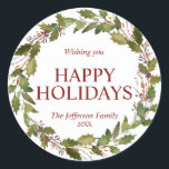 Watercolor Holly Verlasse Wreath Christmas Holiday Runder Aufkleber<br><div class="desc">Liebliche festliche Hand bemalt Aquarellkranz heilig in Grün und tiefroten Beerenfarben. Leicht zu bearbeiten Text. FREUEN SIE SICH AUF URLAUB ODER FREUNDLICHE WEIHNACHTEN & GLÜCKLICHES NEUES JAHR. Macht tolle Karten,  die ihr während der Ferienzeit an Familie und Freunde schicken könnt - toller Sake!</div>