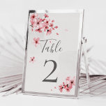 Watercolor Pink Floral Cherry Blossom Wedding Tischnummer<br><div class="desc">Eine moderne,  elegante Hochzeitskarte mit blauen,  rosafarbenen Kirschblüten und moderner Kalligraphie auf einer handgemachten Papierstruktur. Die Tischnummer ist mit einer modernen,  blumengeschmückten Hochzeitskarte versehen.</div>