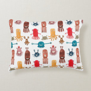 Watercolor seamless pattern of funny monsters and dekokissen