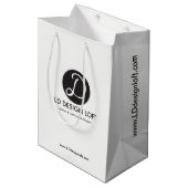 Website der individuell anpassbaren Firma Ihr Logo Mittlere Geschenktüte (Vorderseite Schrägansicht)