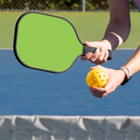Website mit grünem Hintergrund und weißer Grenze Pickleball Schläger (InSitu)