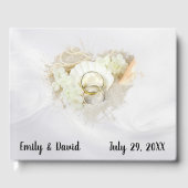 Wedding Rings in Seashell On White Satin Gästebuch (Vorderseite)