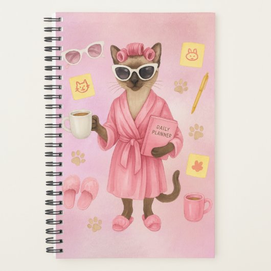 Weibliche Katze hält Terminkalender Planer (Vorderseite)