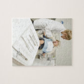 Weibliche Zahnärztin untersucht kleinen Jungen Puzzle (Horizontal)