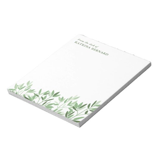 Weiche Grünflächen vom Schreibtisch des Notizblock (Rotiert)