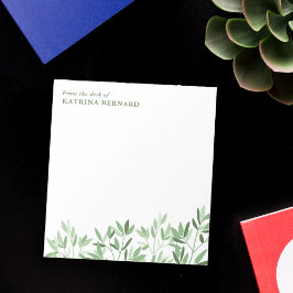 Weiche Grünflächen vom Schreibtisch des Notizblock