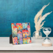 Weiche pastellfarbene kleine Häuser in friedlicher Fotoplatte (InSitu)