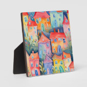 Weiche pastellfarbene kleine Häuser in friedlicher Fotoplatte (Vorderseite)