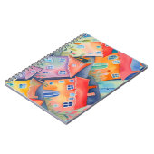 Weiche pastellfarbene kleine Häuser in friedlicher Notizblock (Linke Seite)