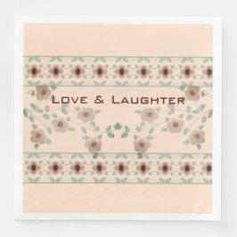 Weiche Pfirsich und grüne Dekorationen Serviette