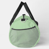 Weicher, blassgrüner Hintergrund mit subtiler Vert Duffle Bag (Rechts)