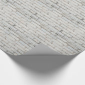 Weiches Bild eines Hintergrundes der grauen Geschenkpapier (Ecke)