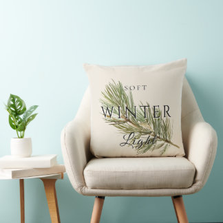 Weiches Winterlicht mit Kiefernzweig Kissen