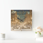 Weihlich naverschneite Straßen einer Innenstadt Quadratische Wanduhr (Zuhause)