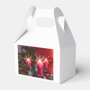 Weihnacht,Advent, brennende rosa Kerzen festlich, Geschenkschachtel