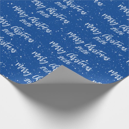 Weihnachten 2025 Text über Blau Geschenkpapier (Ecke)