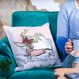 Weihnachten Dachschund durch den schneefestlichen Kissen