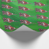 Weihnachten des Hundes auf Grün Geschenkpapier (Ecke)