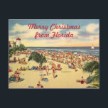 Weihnachten Florida Beach Gruß<br><div class="desc">Vintage Strandszene in Florida mit eigenem Text: Frohe Weihnachten aus Florida oder bearbeiten Sie zu den Wörtern Ihrer Wahl. Alte antike Postkartenabbildungen mit vielen Menschen am Strand,  Palmen,  einem Leuchtturm und einem Segelboot Sets die Kulisse für einen guten altmodischen Urlaub Gruß.</div>