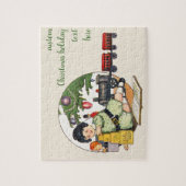 Weihnachten, glücklicher Junge spielen mit Spielze Puzzle (Vertikal)