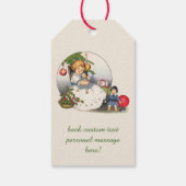 Weihnachten, glückliches Mädchen spielen mit Puppe Geschenkanhänger (Rückseite)