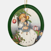 Weihnachten, glückliches Mädchen spielen mit Puppe Keramik Ornament (Links)