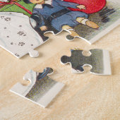 Weihnachten, glückliches Mädchen spielen mit Puppe Puzzle (Seite)