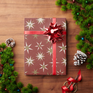 Weihnachten Gold Geo Stars - auf rotem Muster. Geschenkpapier
