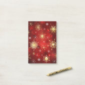 Weihnachten Goldene Schneeflocken im roten Hinterg Post-it Klebezettel (Auf Schreibtisch)