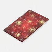 Weihnachten Goldene Schneeflocken im roten Hinterg Post-it Klebezettel (angewinkelt)