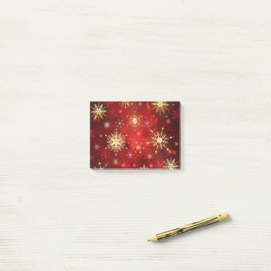 Weihnachten Goldene Schneeflocken im roten Hinterg Post-it Klebezettel (Auf Schreibtisch)