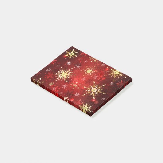 Weihnachten Goldene Schneeflocken im roten Hinterg Post-it Klebezettel (angewinkelt)