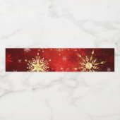 Weihnachten Goldene Schneeflocken im roten Hinterg Wasserflaschenetikett (Einzelnes Label)