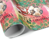 Weihnachten im Fußball mit dem Weihnachtsmann beim Geschenkpapier (Rolleneckpunkt)
