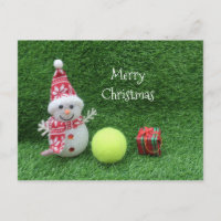 Weihnachten im Tennis mit Schneemann und Tennisbal