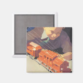 Weihnachten, Junge spielen mit Spielzeugbahnen Magnet (Vorderseite/Rückseite)